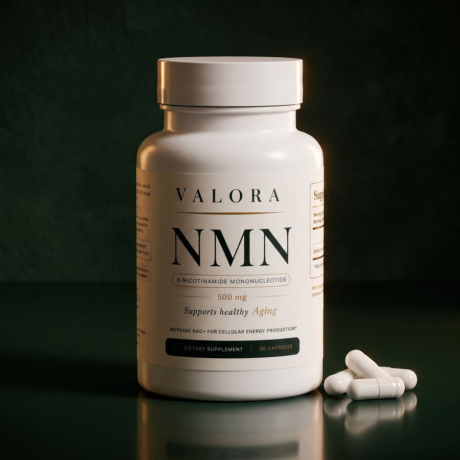 The VALORA NMN bottle in a warm, dark, premium setting with capsules beside it